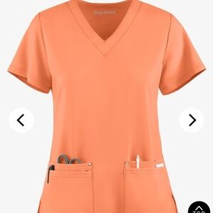 Easy Stretch Womens V-Neck Scrub Top- Color: Coral Haze- Size LG.